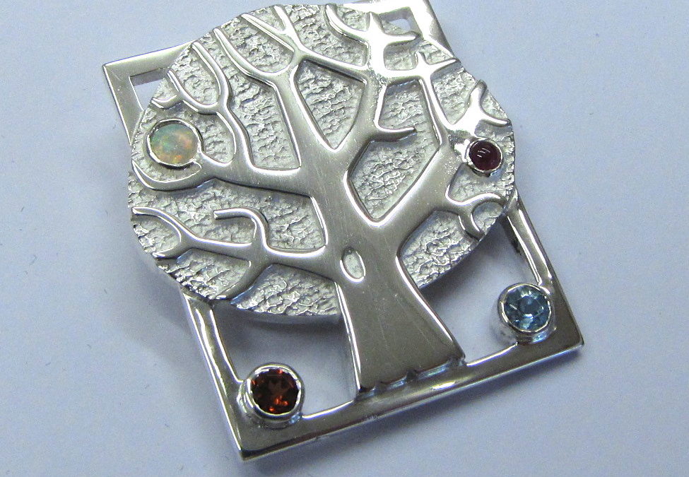 Silver tree brooch with birthstones