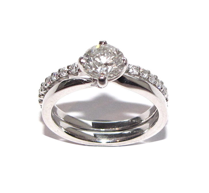 Claw set diamond wedding ring