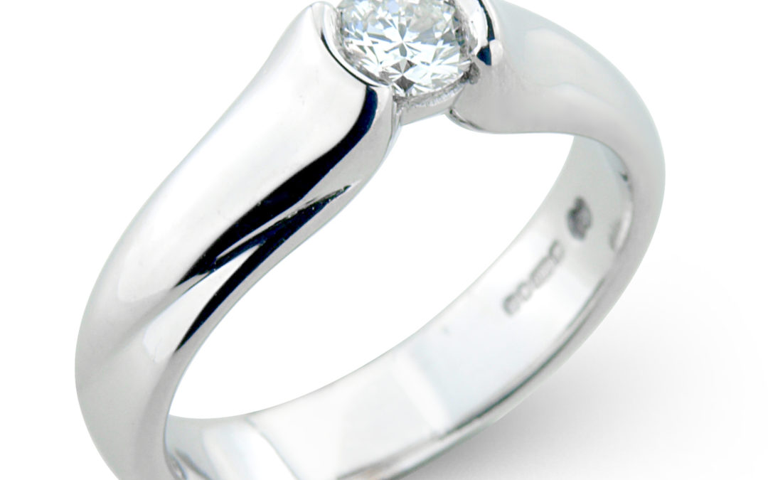 18ct white gold semi rub-over diamond ring